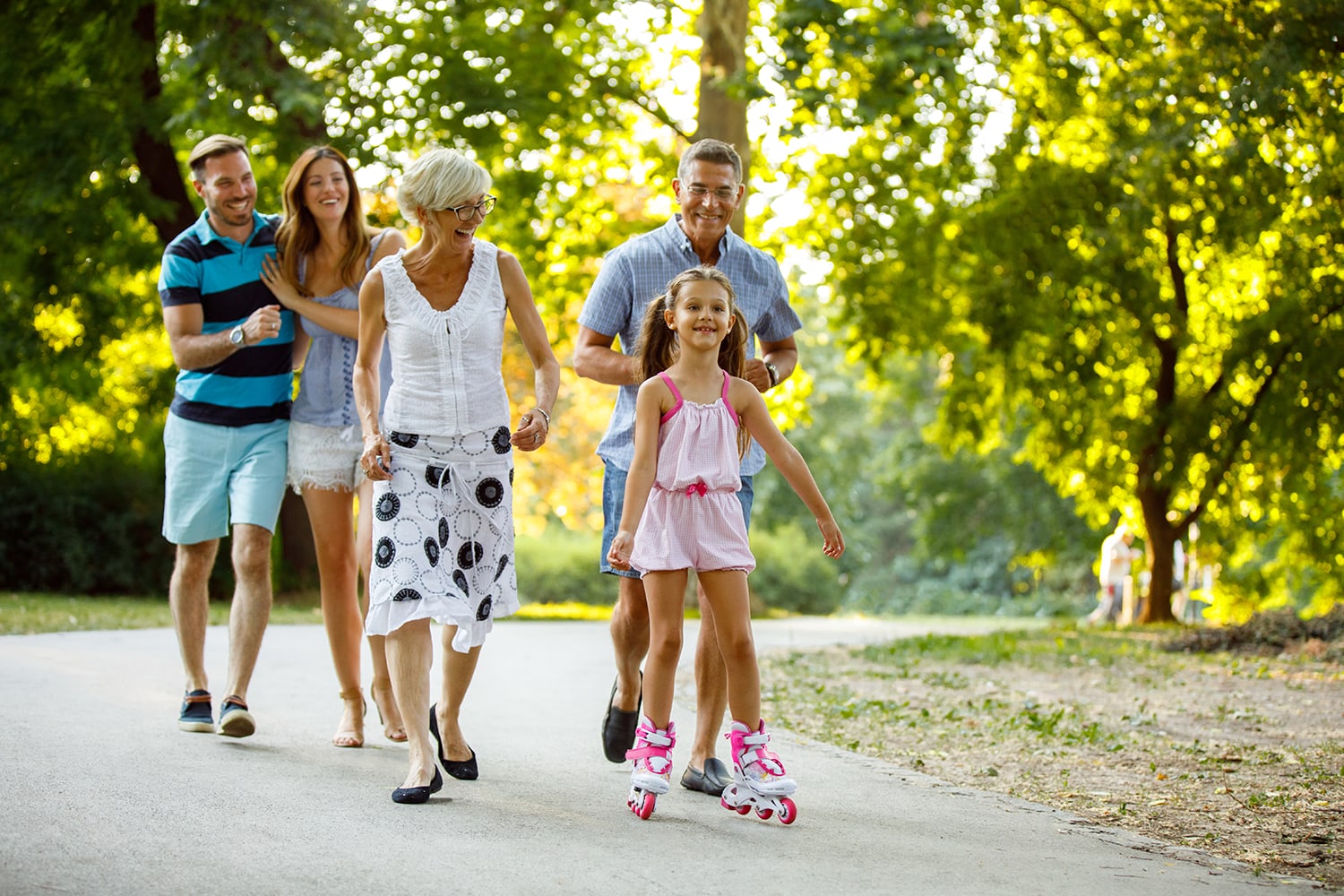 Family walking outside to represent everyday hearing goals