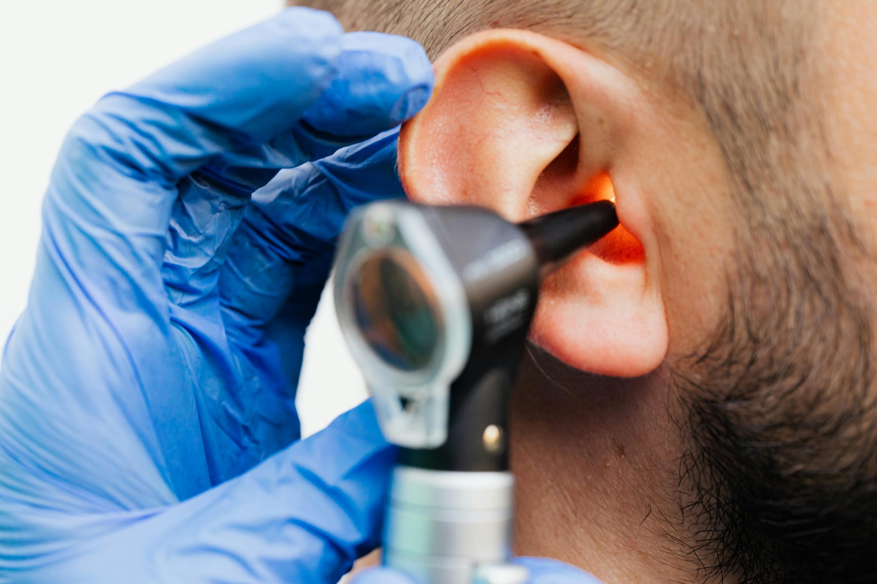 Patient discussing hearing concerns during an audiology consultation